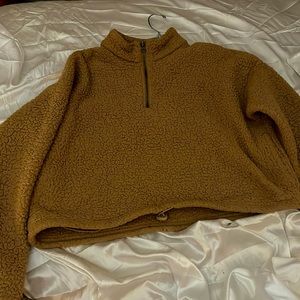 Tan/Brown fluffy cropped jacket from American eagle. I bought 2 on accident 😂